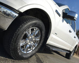 ColorLugs white colored lug covers on silver truck wheel