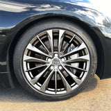 ColorLugs white colored lug covers on silver automobile wheel